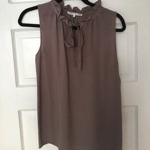 Sleeveless Blouse with Ruffle and Tie Detail